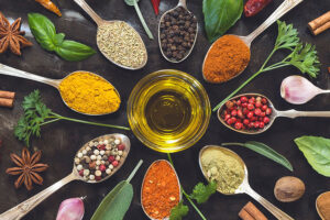 A variety of herbs and spices that any chef or homemaker could use to add unique flavors to their typical salad in Springfield, IL.